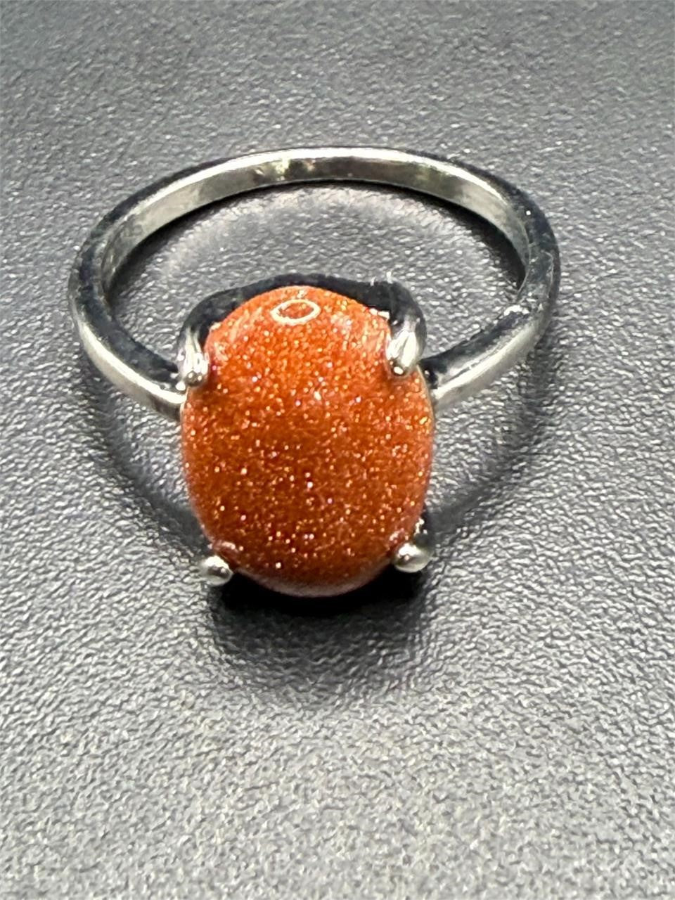 Sterling silver Carnelian gemstone ring size 9 by Republic Mercantile, featuring a vibrant orange oval cabochon in a polished setting.