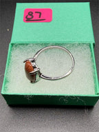 Sterling silver Carnelian gemstone ring in size 9 with engraved band by Republic Mercantile, showcasing vibrant orange gemstone and detailed design.