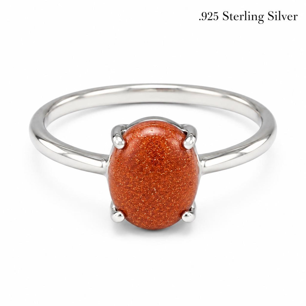 Sterling silver Carnelian gemstone ring size 9 by Republic Mercantile, featuring a vibrant orange-red oval cabochon gemstone.