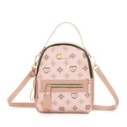 Pink Aohao heart shape crossbody backpack made of faux leather with zipper closure, stylish and compact for everyday use.