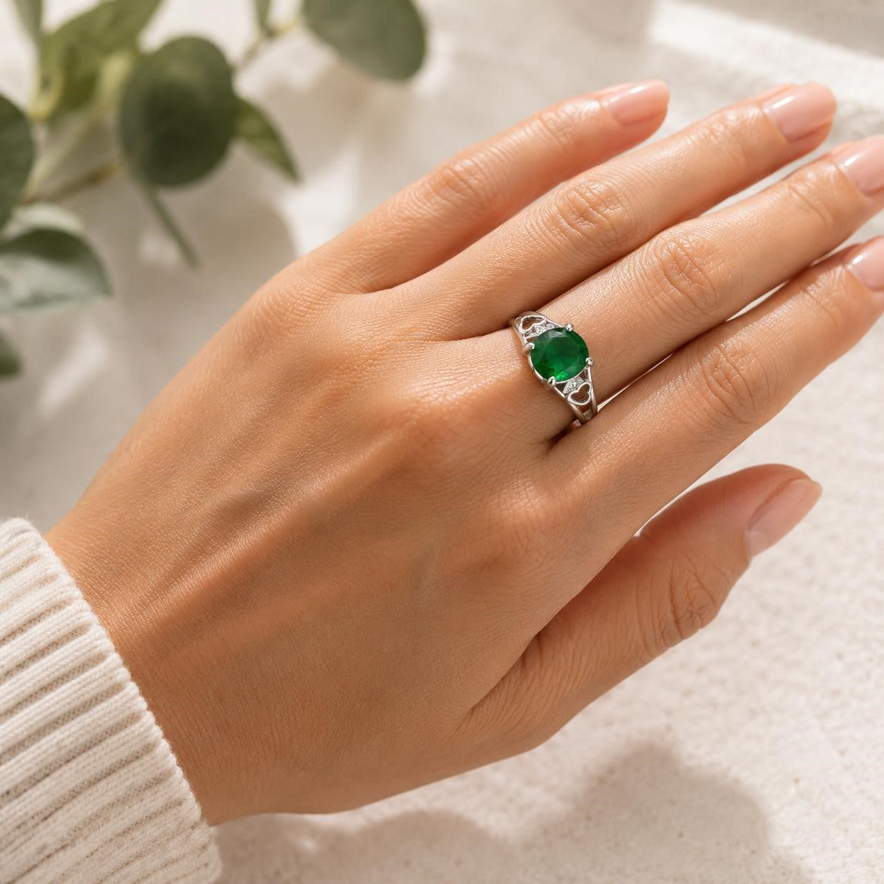 Sterling silver oval cut Helenite gemstone solitaire ring in size 8, featuring a polished band and a vibrant green gemstone.