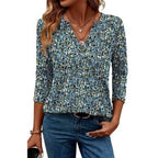 Ronuti women's 3/4 sleeve V-neck tunic blouse with loose fit and curved hem, displayed on a mannequin in size M.