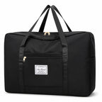 Black travel foldable tote bag by Nice Travel, showing a compact, lightweight design with handles and a spacious interior for travel.