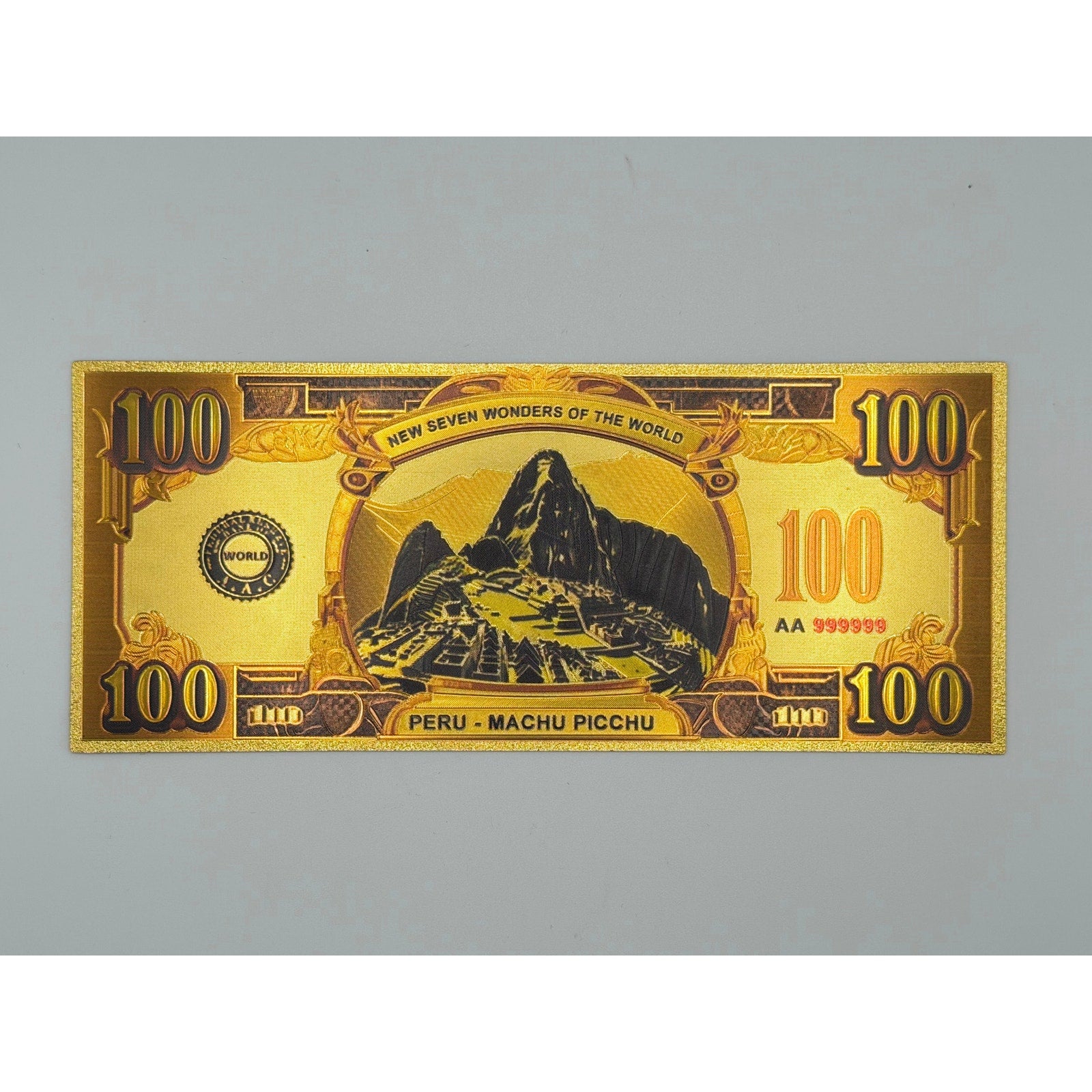 Set of seven gold foiled novelty notes featuring the 7 Wonders of the World, from Republic Mercantile, with intricate designs.