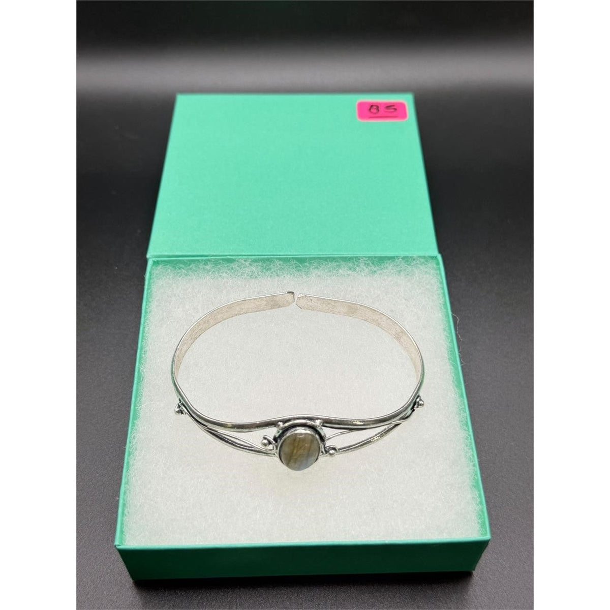 Handcrafted silver plated bangle gem bracelet with intricate design and sparkling gemstone accents, stylish jewelry by Republic Mercantile