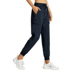 Rosvigor women's cargo hiking pants in navy, lightweight joggers, size M, displayed on a model for outdoor activewear.