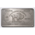 Close-up of a 1 oz .999 fine titanium collectible bar from CMC Mint with detailed engravings and branding.