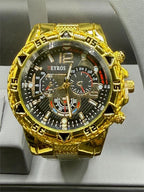 Men's Deyros gold watch with matching band by Republic Mercantile, featuring a round dial and classic gold finish.