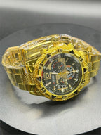 Men's Deyros gold watch with matching band by Republic Mercantile, featuring a sleek round dial and elegant gold finish.