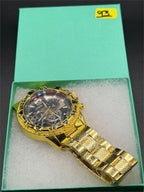 Men's Deyros gold watch with matching band by Republic Mercantile, featuring a round dial and sleek gold finish.