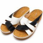 Xuemjiao women's slip-on sandals in white and black, size 11.5-12, EU 43, with open-toe design and comfortable style