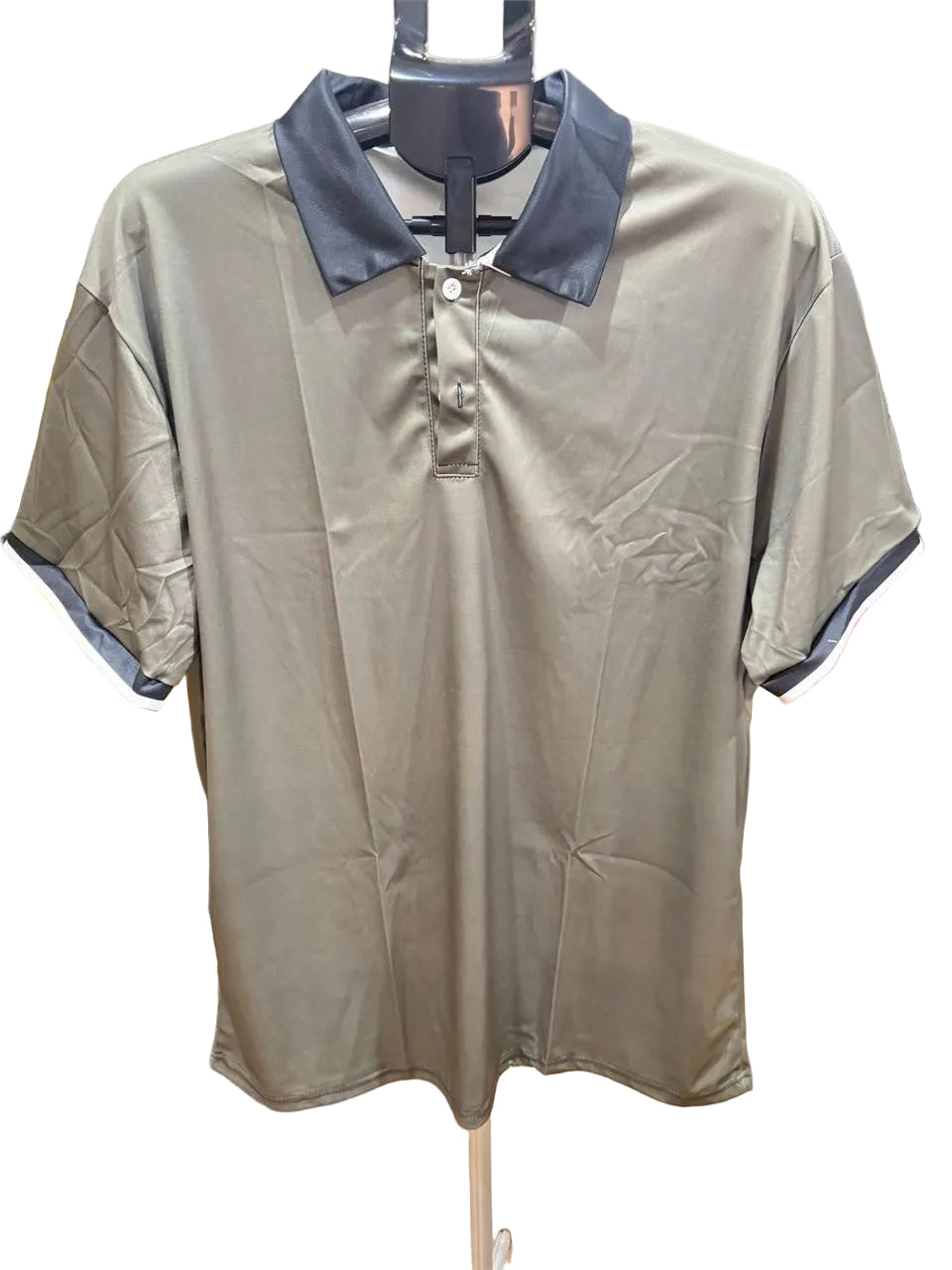 Men's green polo shirt with black collar, size XXL, by Republic Mercantile, displayed on a hanger.