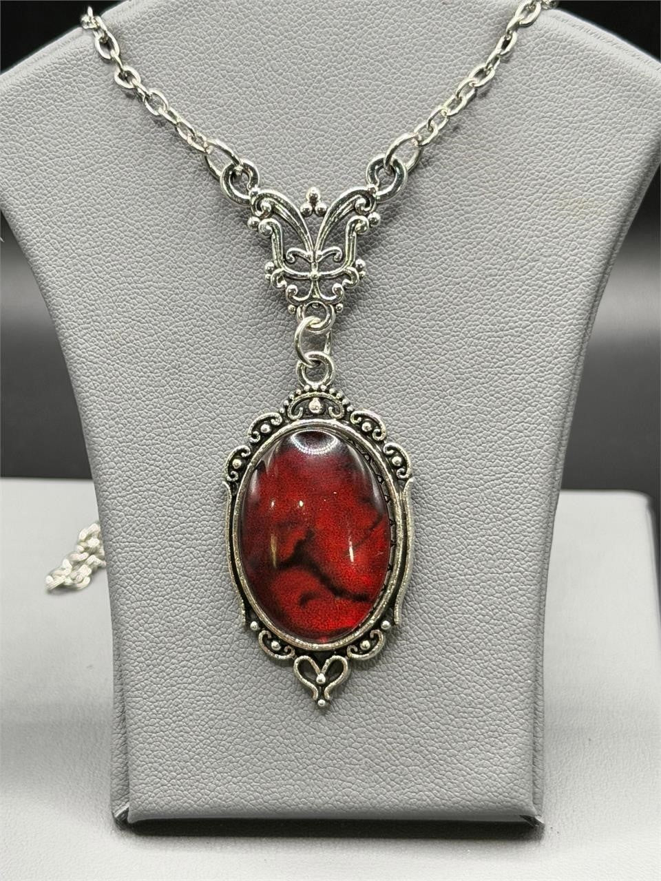 Boho style oversized gemstone pendant necklace by Republic Mercantile with colorful stone and intricate chain design.