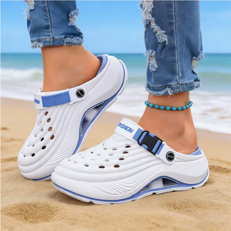 Fashion thick-soled elevated casual beach Crocs slides in size 13.5-14, featuring comfortable design and stylish slip-on style.