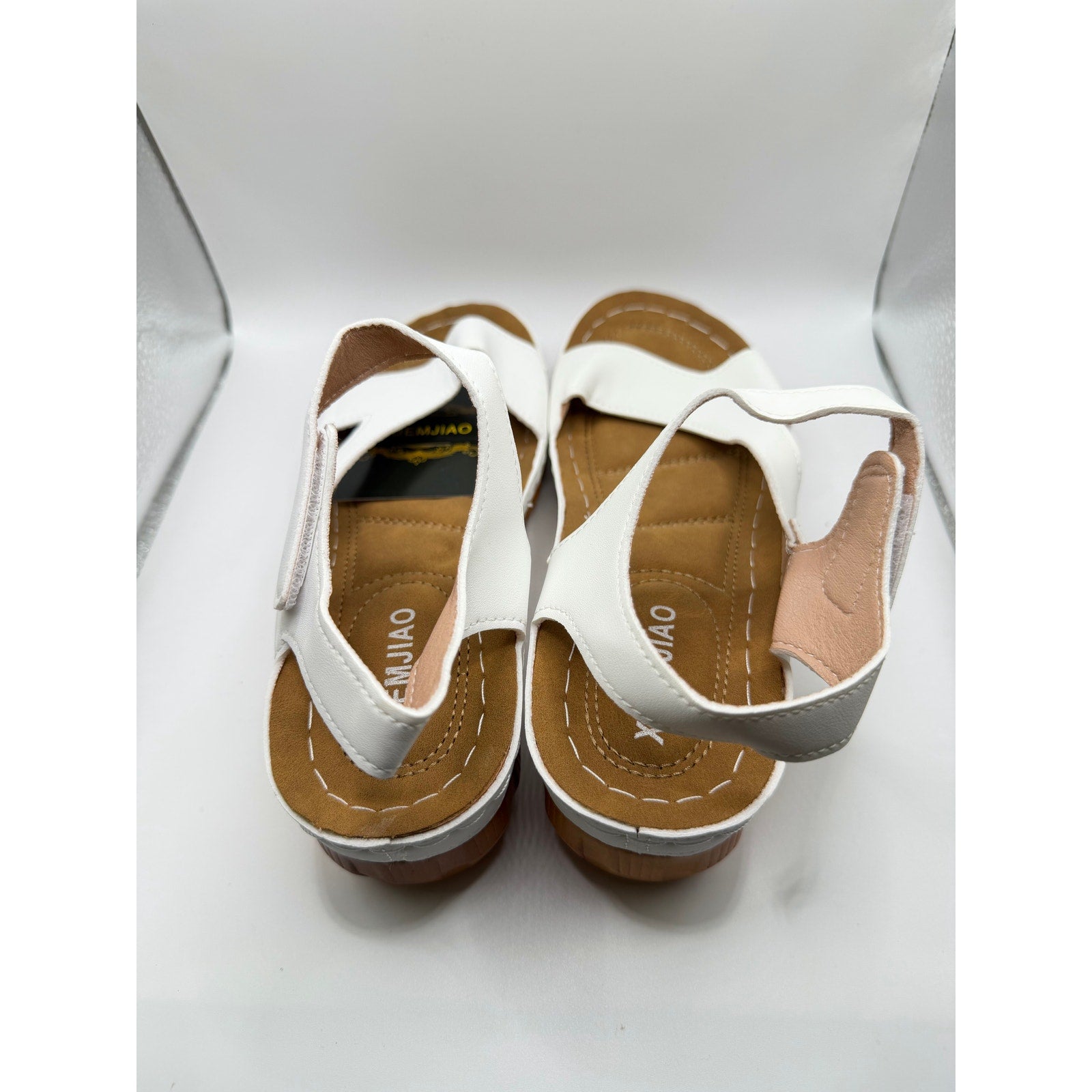 Women's white cushioned strap sandals by Xuemjiao, size 6.5 (Euro 37), featuring comfortable padding and open-toe design.