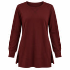 Moshu women's crewneck sweatshirt with side splits, long sleeves, in size XL, shown in a relaxed fit on a model.