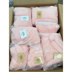 Set of 21 pink and white infant jumpsuits from Republic Mercantile's Manifested Reseller's Wholesale Box, displayed in a neat arrangement.