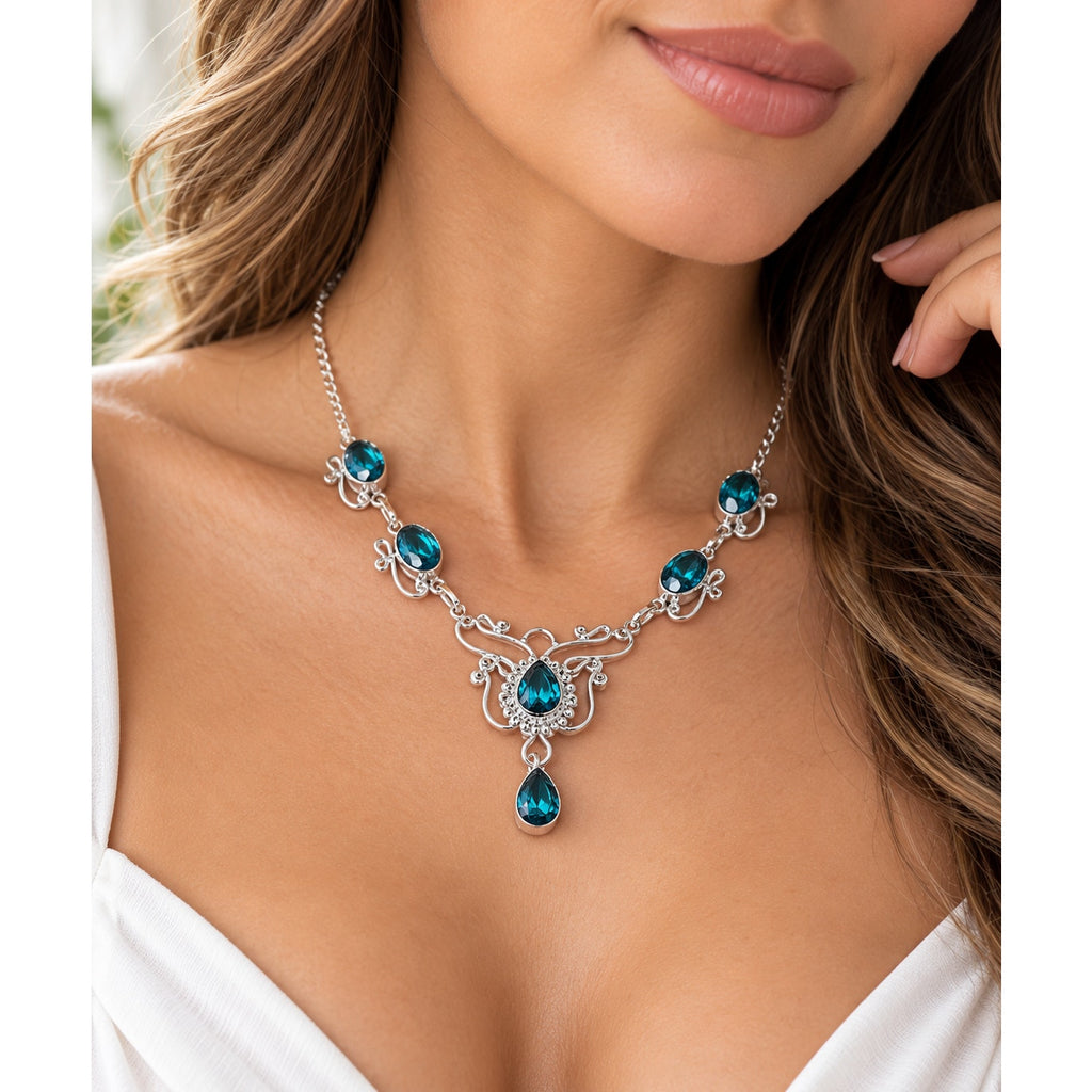 Sterling silver plated necklace featuring a London Blue Pear Topaz gemstone pendant from Republic Mercantile.