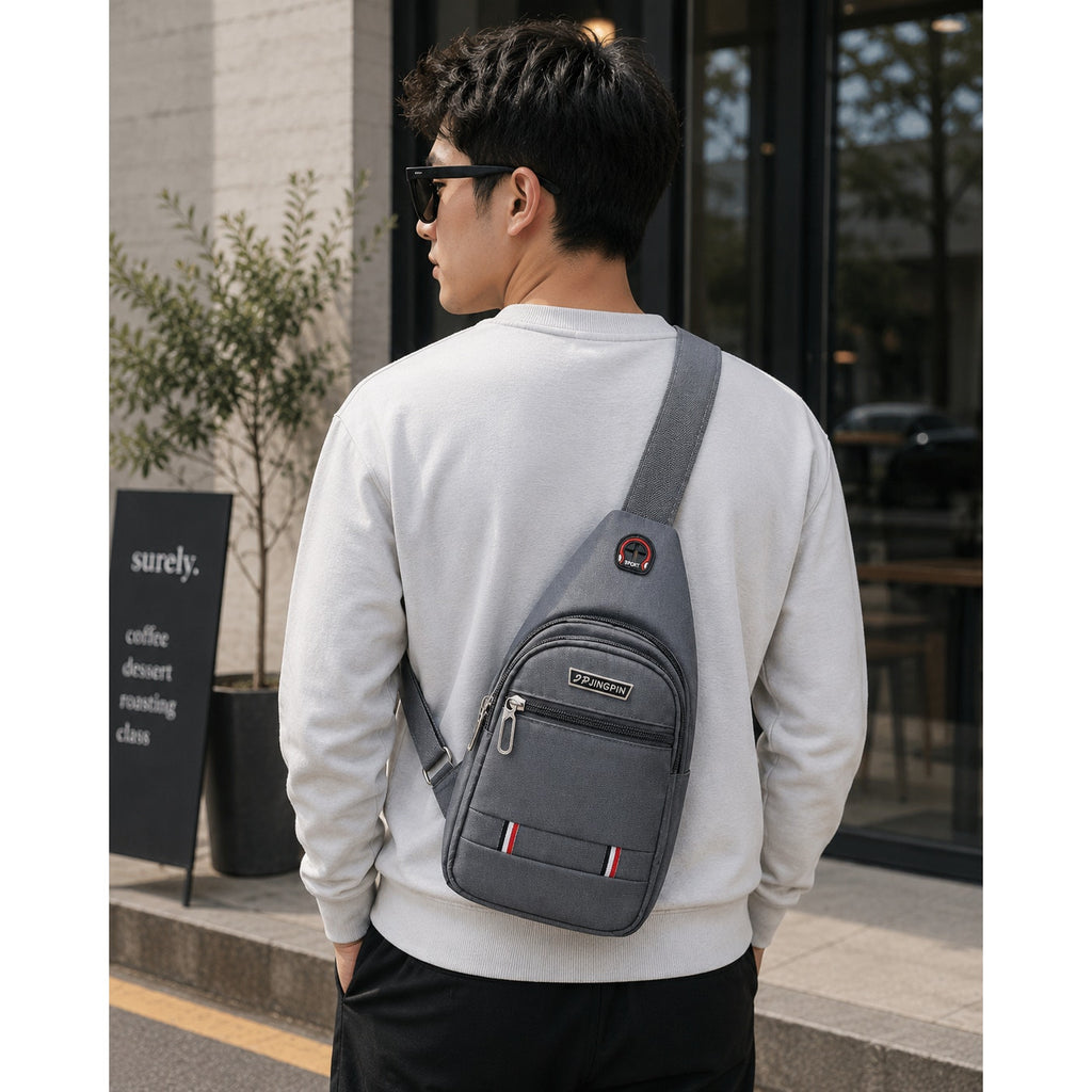 Gray Jingpin Daily Single Strap Crossbody Backpack for unisex use, showing the sleek design and adjustable strap.