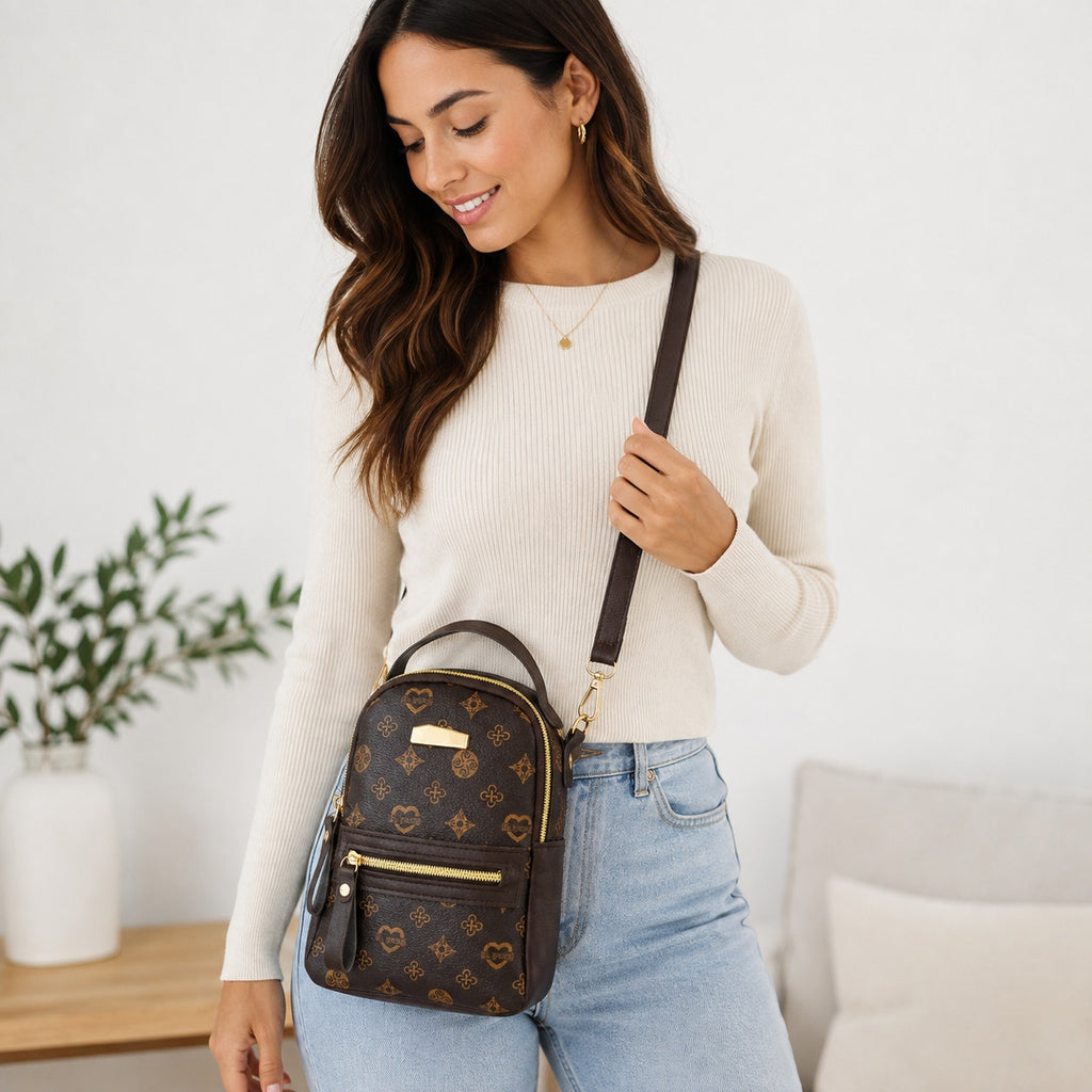 Brown Aohao heart-shaped crossbody backpack with faux leather, zipper closure, and stylish design.