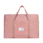 Pink 11"x16.5" travel tote bag by Nice Travel with sturdy handles and spacious interior for carry-on essentials.