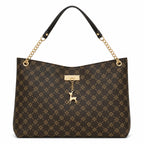 Dark brown Sandglass women's casual shoulder tote bag with spacious interior and sturdy handles, perfect for everyday use.