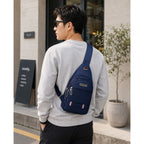 Blue Jingpin Daily Single Strap Crossbody Backpack for men and women, showing the compact, stylish unisex design.