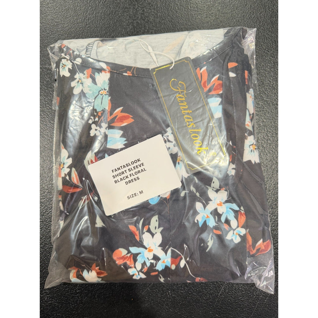 Fantaslook black floral dress in size M, featuring a fitted bodice and flowy skirt with vibrant floral pattern.