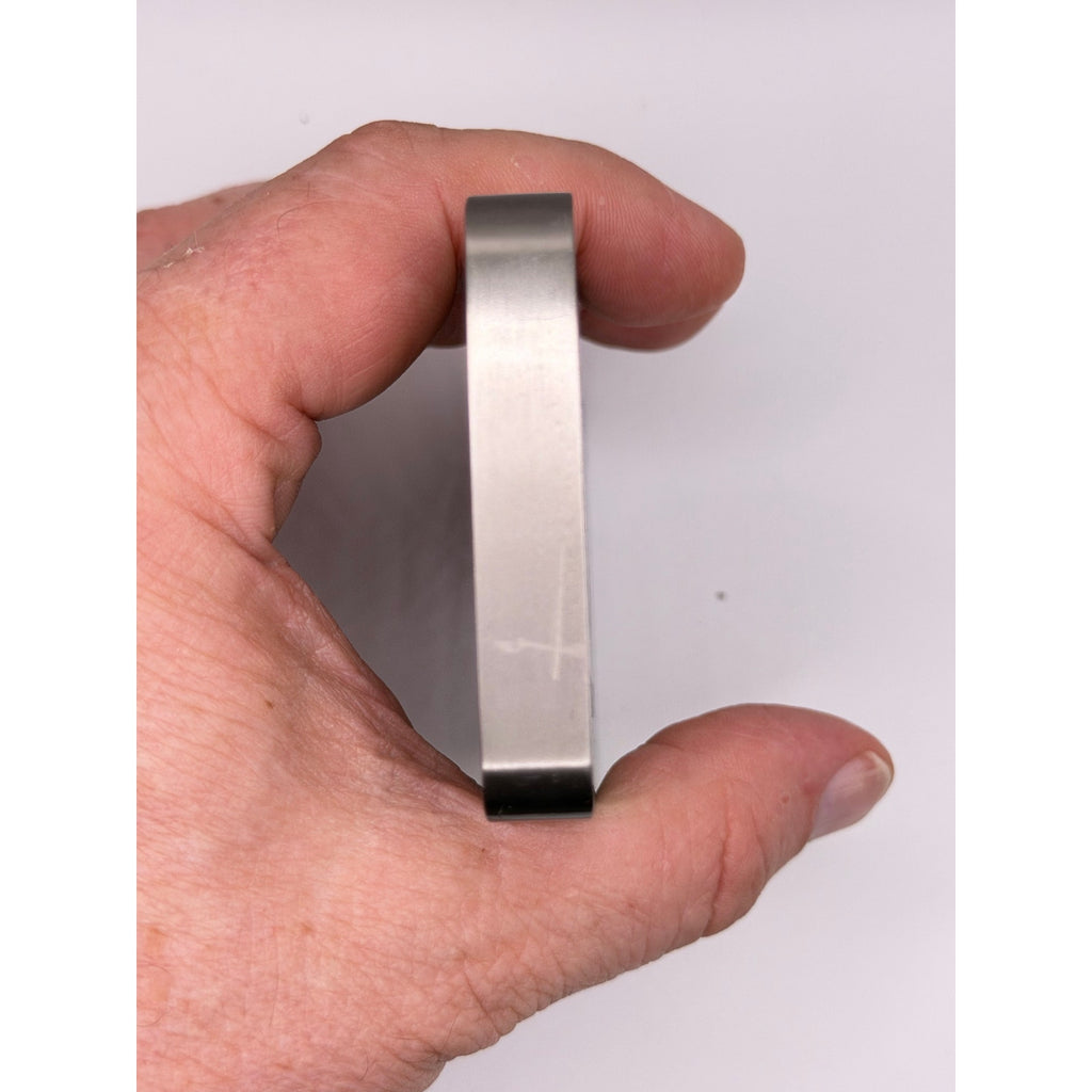 Ten Troy oz CMC Mint .999 fine titanium collectible bar with detailed engravings and brand logo visible in the image.