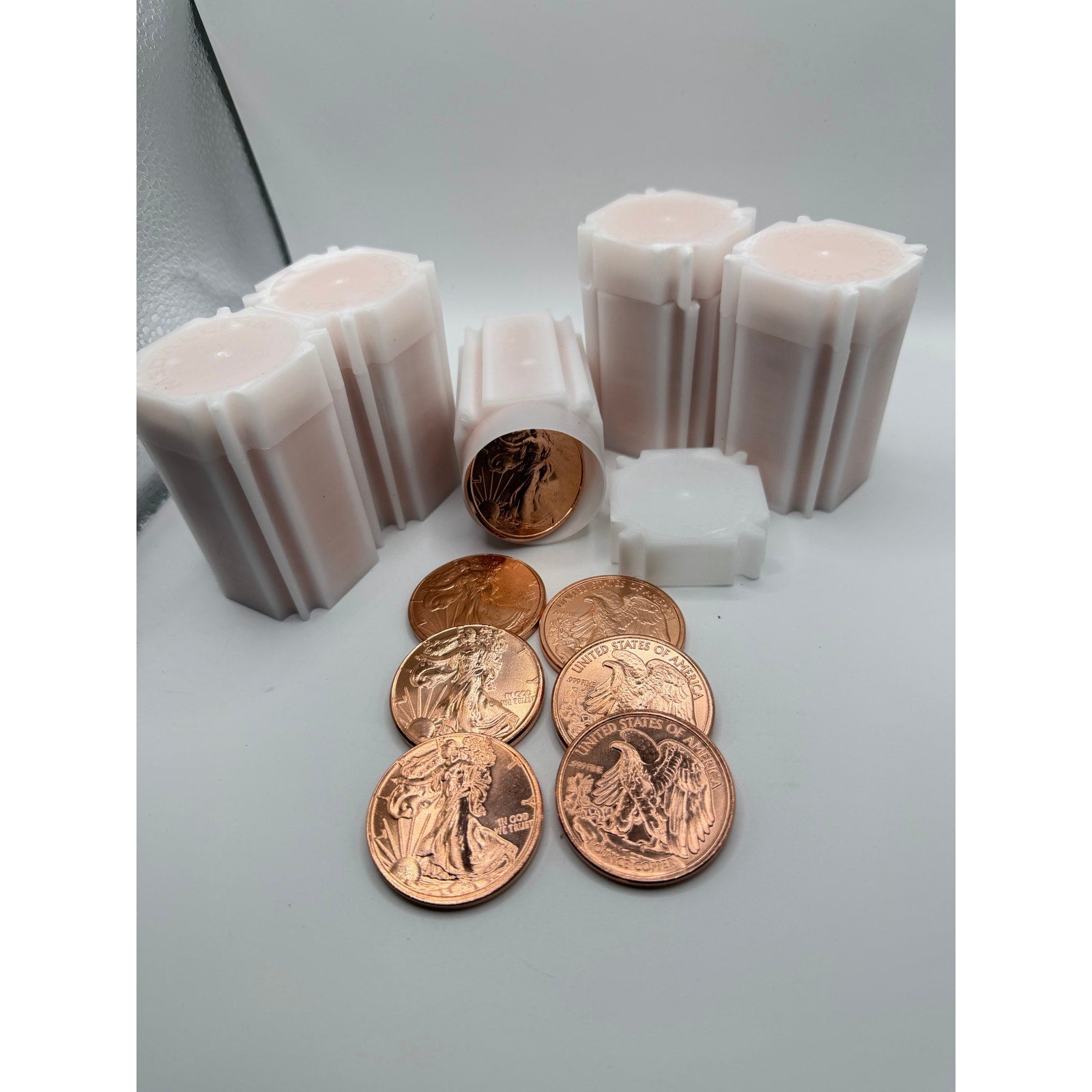 Collection of 100 Republic Mercantile 1oz .999 fine copper Walking Liberty collectible coins in five tubes.