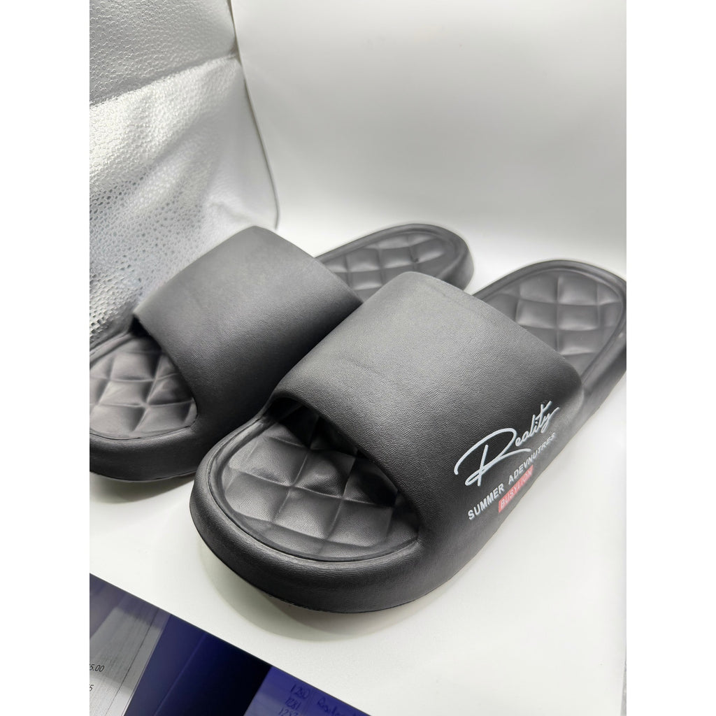 Black Busy Lion Reality Summer Adventures slides in size 9.5-10, featuring a fun lion design and casual slide sandal style.