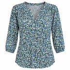 Ronuti women's 3/4 sleeve V-neck tunic shirt with loose fit and curved hem, size M, shown on a mannequin.