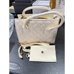 Cream ladies handbag carry purse with 8x6x3 inch size, stylish Republic Mercantile bag shown with open top and shoulder strap.