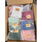 Wholesale box of 50 new women's dresses from Republic Mercantile, featuring a variety of styles, weighs 36 pounds.