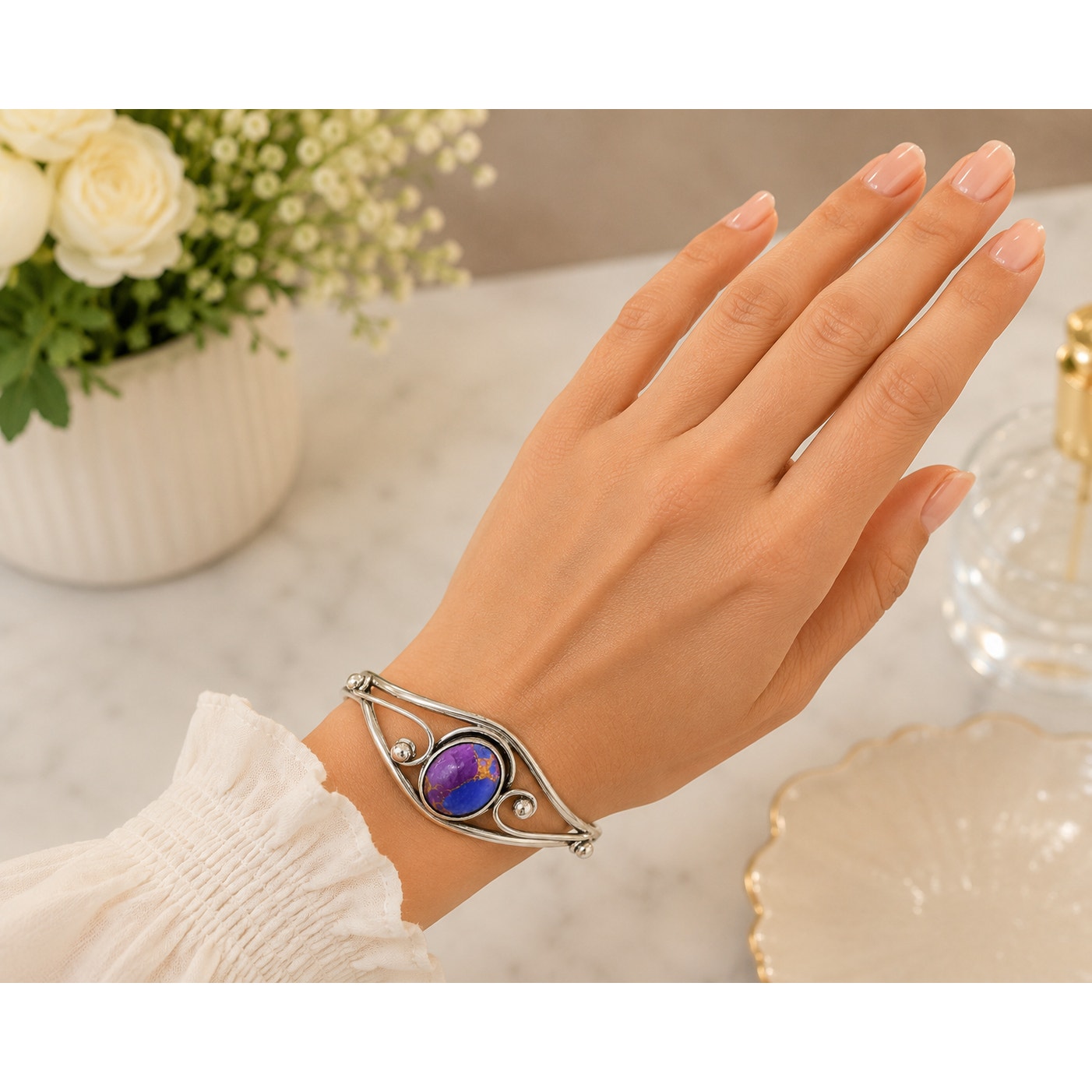 Silver plated bangle gem bracelet with handcrafted design and intricate detailing, featuring vibrant gemstone accents.