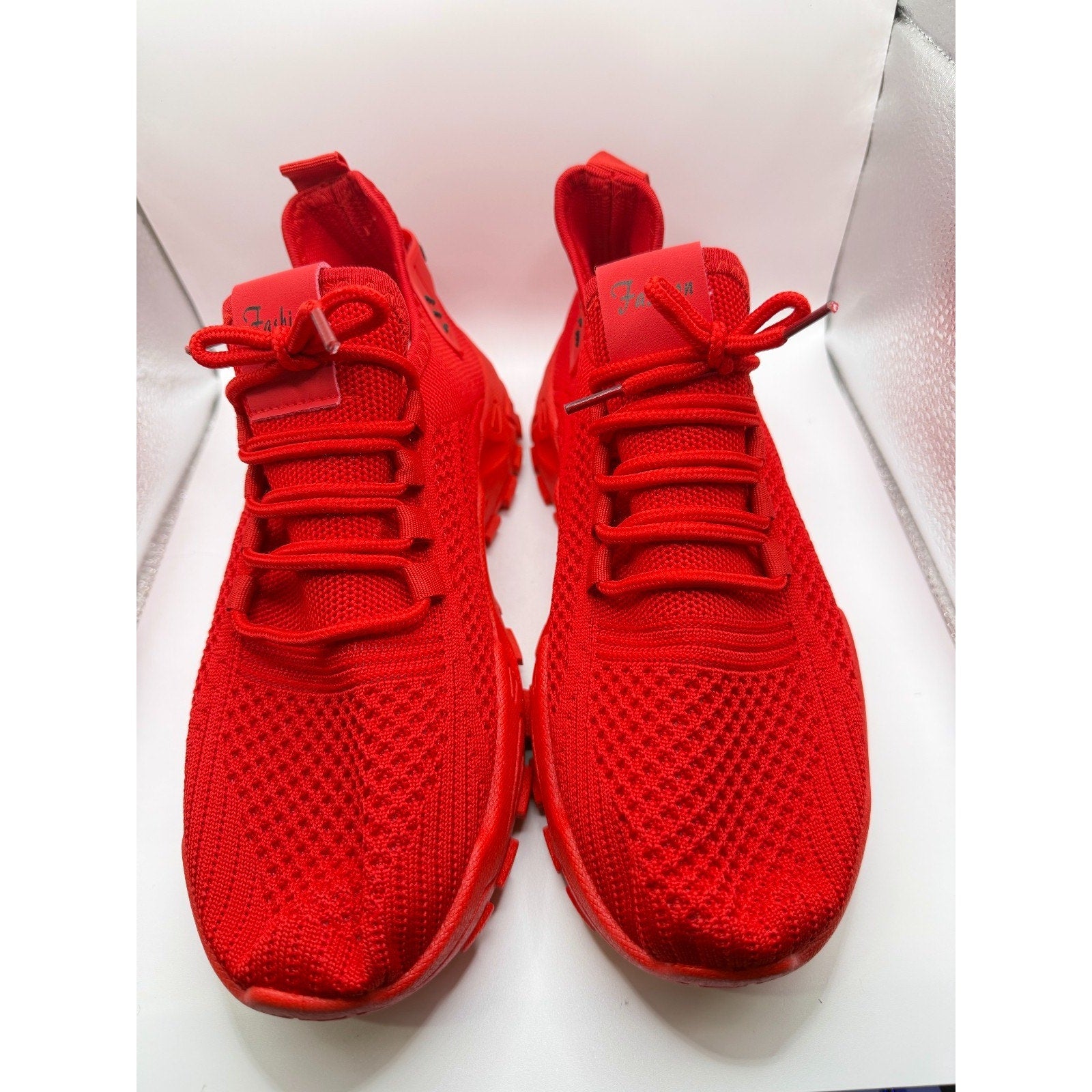 Red women's athletic sneakers by Republic Mercantile with black accents, size 10.5, shown from a side view.