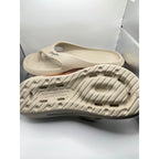 Busylion beige slip-on comfort unisex slides in size 9.5 men's, featuring a casual open-toe design and cushioned sole.