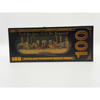 Bronze-colored Jesus Christ Last Supper tribute novelty note featuring detailed religious artwork and biblical scene design.